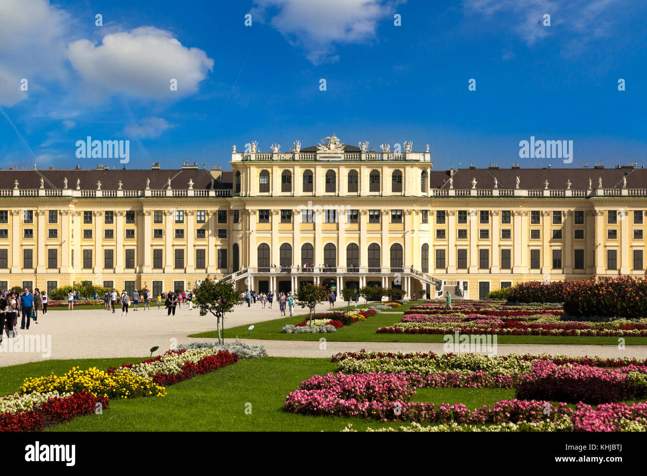 VIENNA, AUSTRIA - SEPTEMBER 11, 2016 : View of Schönbrunn Palace, one of best touristic attractions in Vienna on bright sky background. It is baroque  Stock Photo