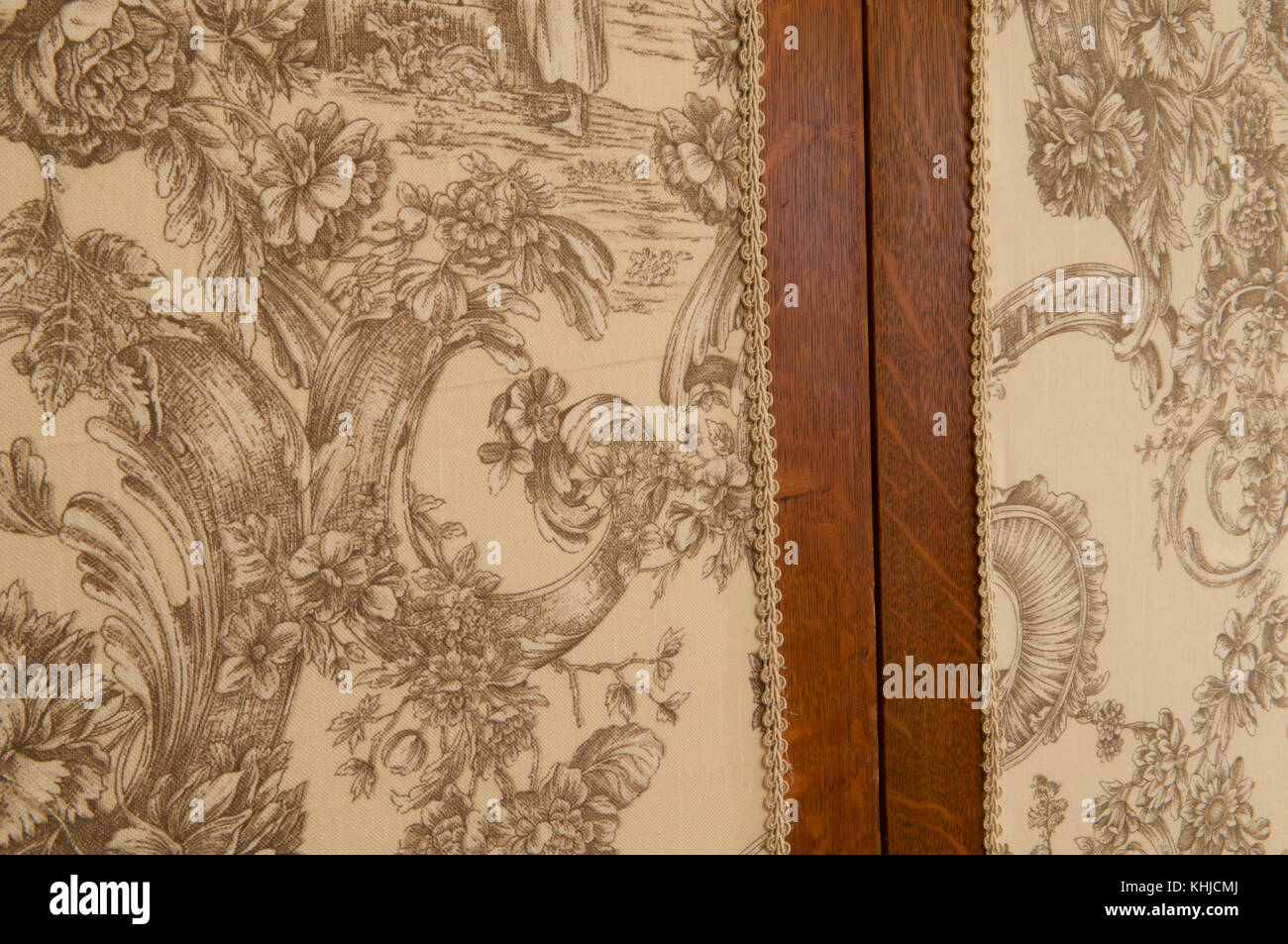 A close up of two fabric doors to a wardrobe in a bedroom. Stock Photo