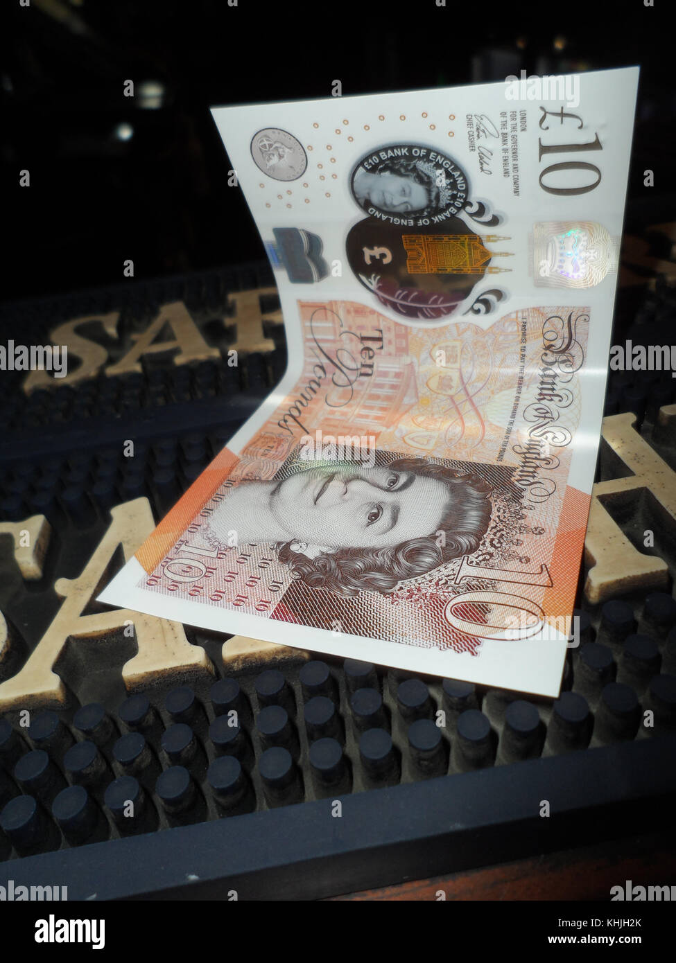 British ten pound note resting on a bar mat in an English pub Stock