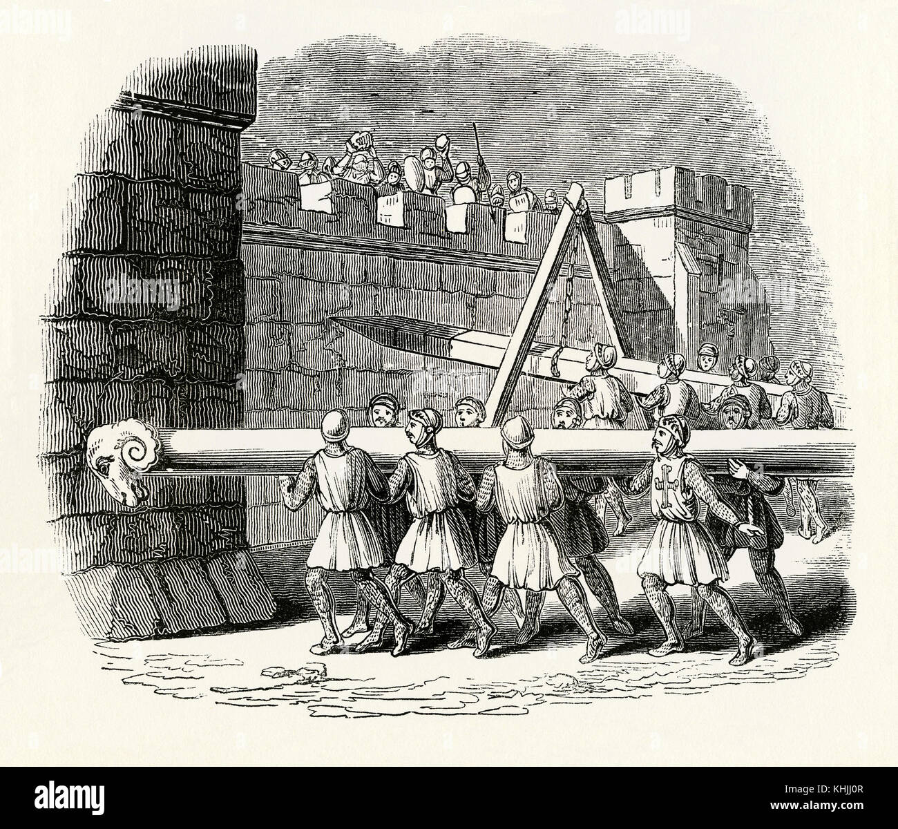 An old engraving depicting battle scene in Medieval times - it shows  machines or devices used when attacking castle walls - here battering rams.  One of the battering rams has a pointed
