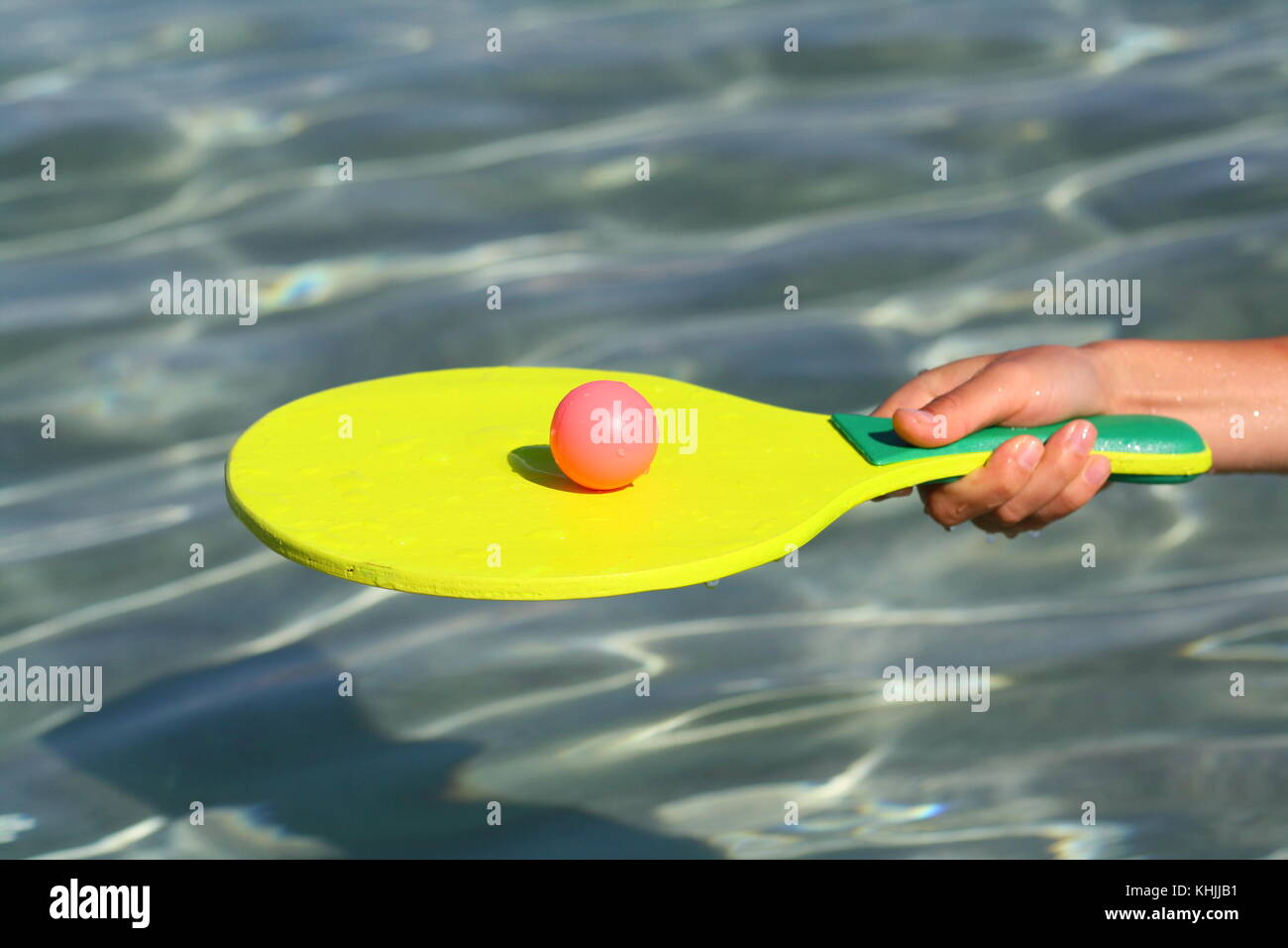 Woman beach paddle ball hires stock photography and images Alamy
