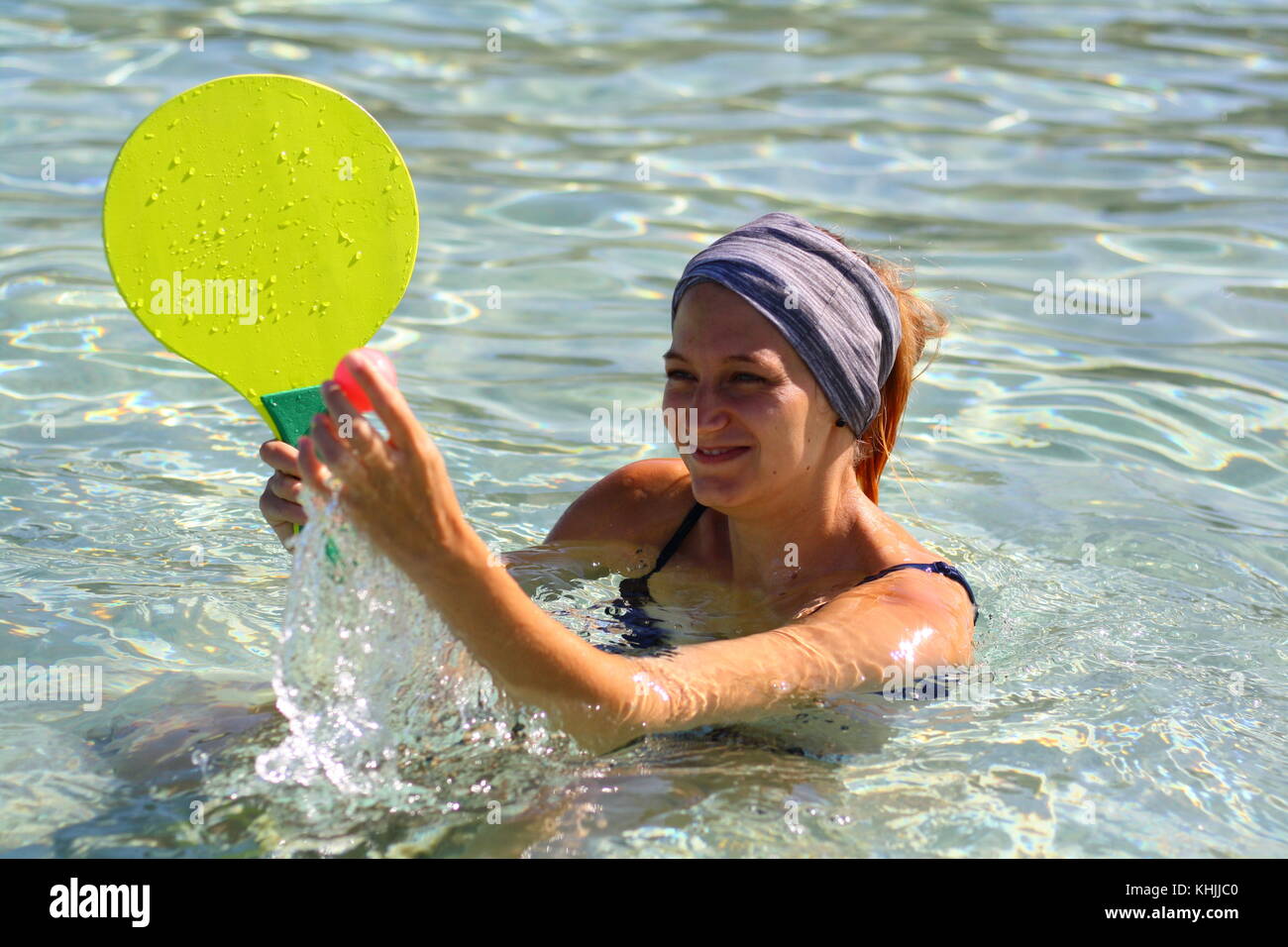 Woman beach paddle ball hires stock photography and images Alamy