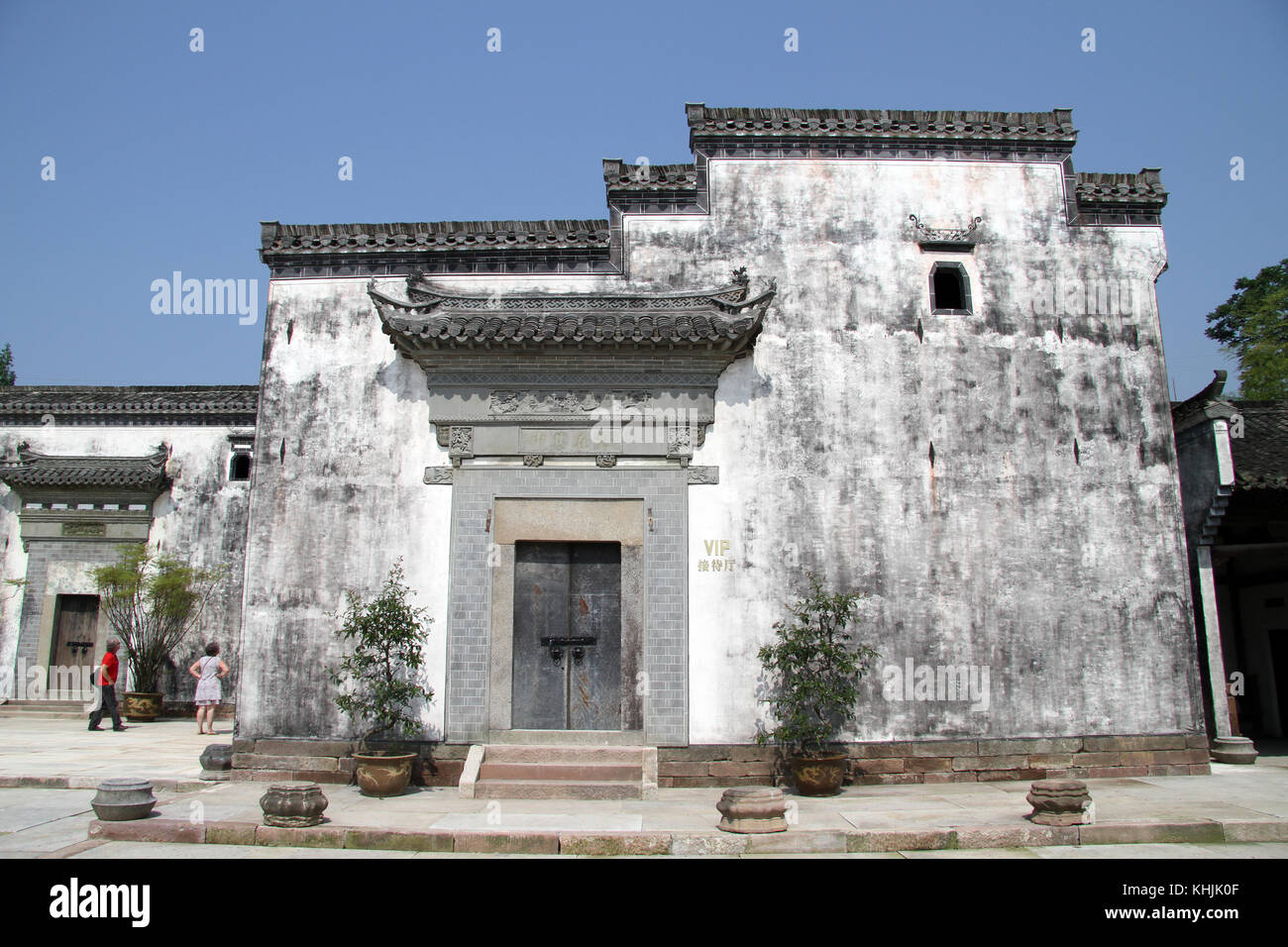 Tourists and old white houses in Shexian town, China Stock Photo