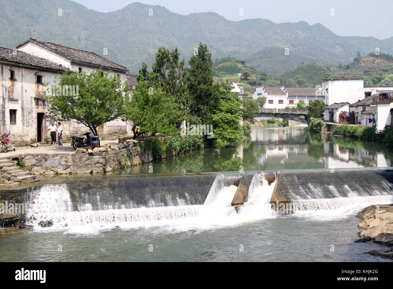 Dam, river and houses in Shexian town, China Stock Photo