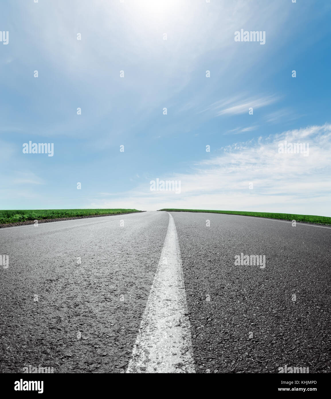 Empty road under sunset sky hi-res stock photography and images - Alamy