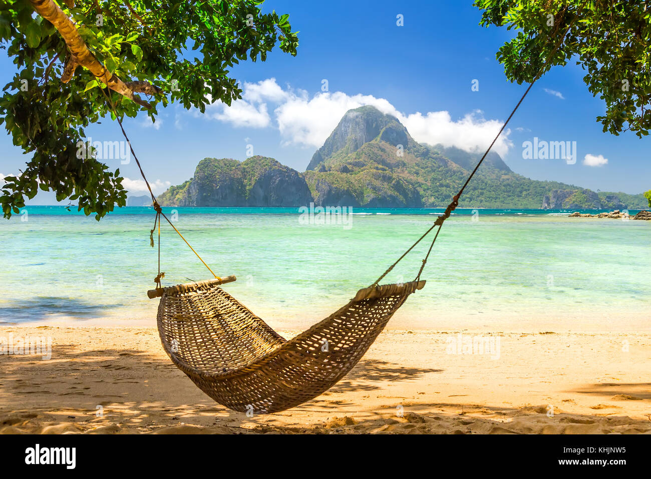 Traditional hammock in the shade on a tropical island Stock Photo Alamy