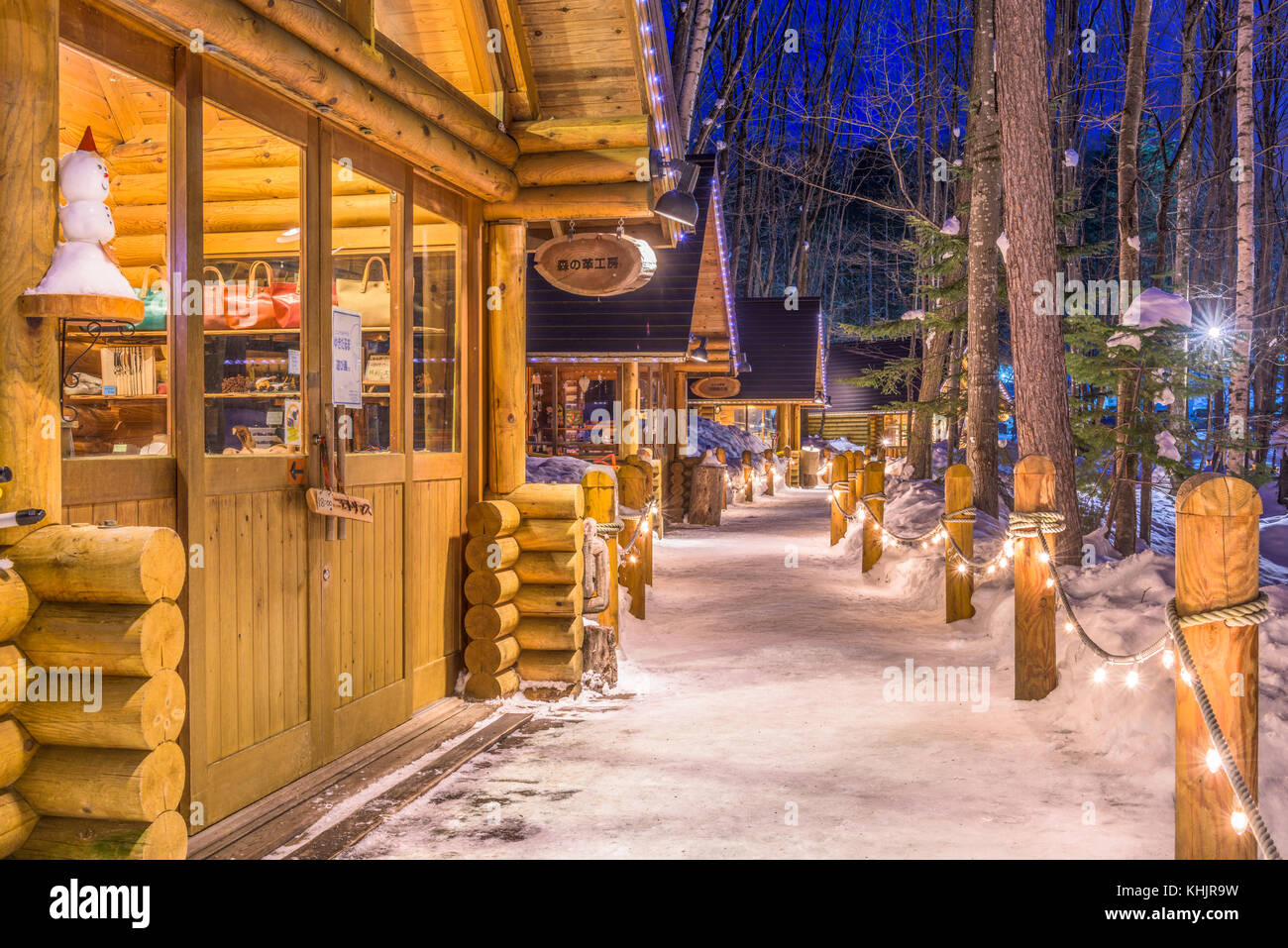 FURANO, JAPAN - FEBRUARY 15, 2017: Ningle Terrace at twilight. The collection of cottages situated in the woods are boutique shops specializing in han Stock Photo