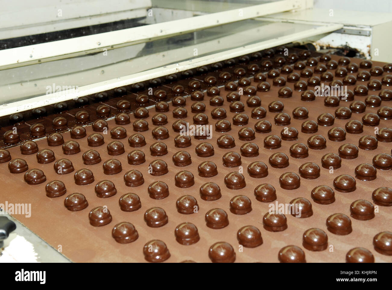 Production of chocolates, factory conveyor Stock Photo Alamy