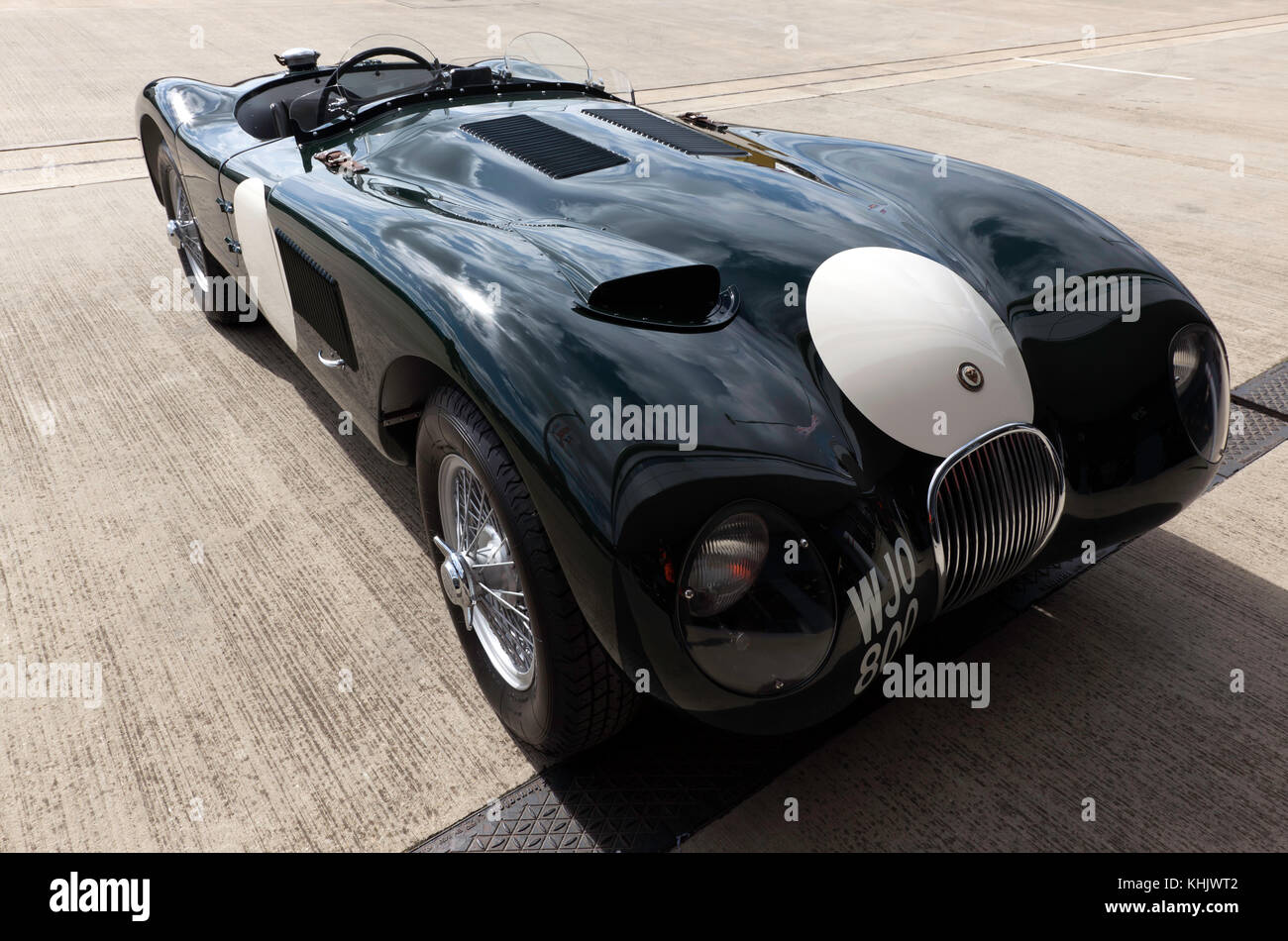 Three-quarter front view of a Jaguar C-Type  in the International Paddock, at the 2017 Silverstone Classic Stock Photo