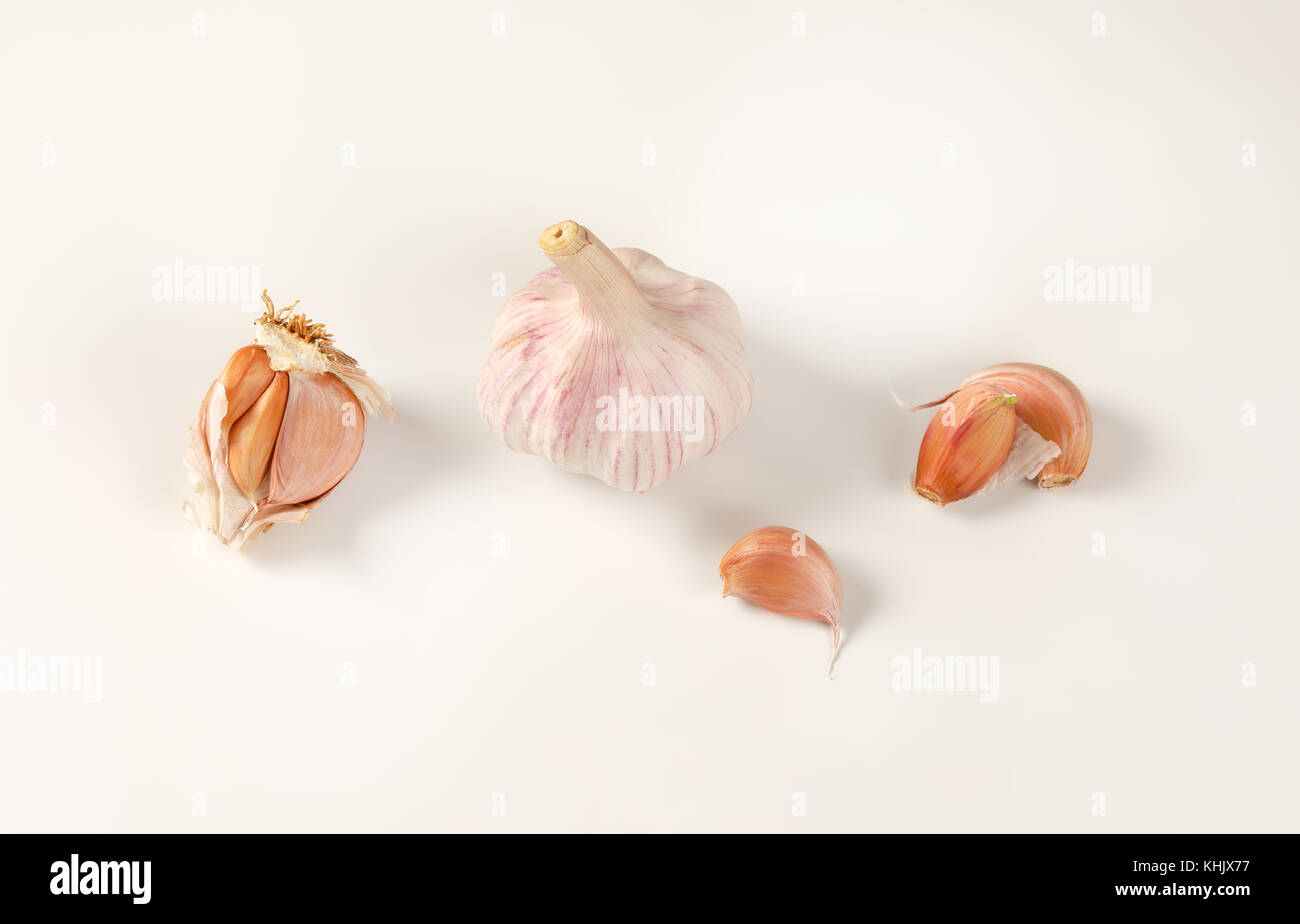 bulb and cloves of fresh garlic on white background Stock Photo - Alamy