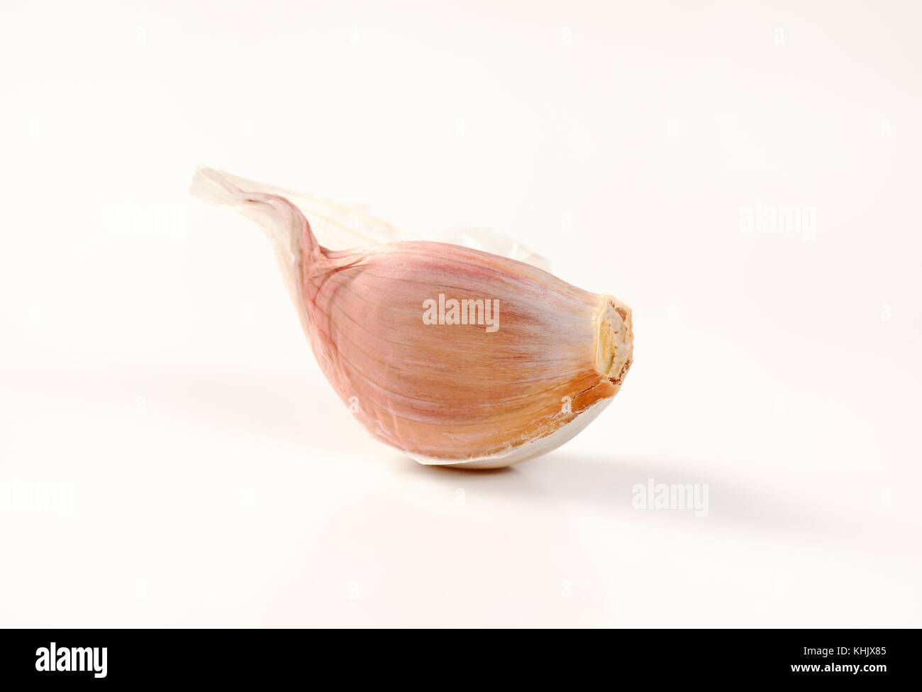 clove of fresh garlic on white background - close up Stock Photo - Alamy