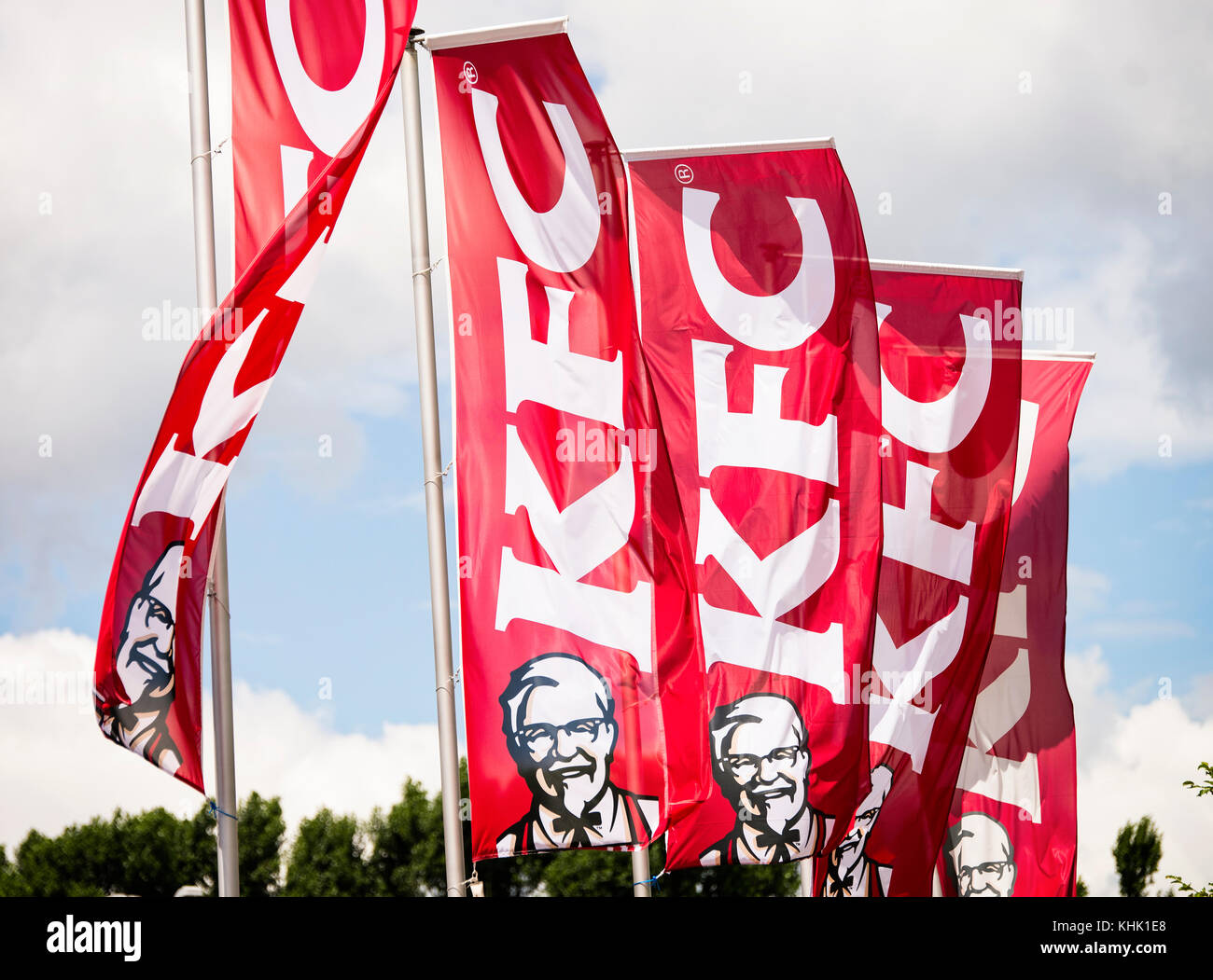 Kentucky Fried Chicken flags in front of a KFC restaurant near Frankfurt am Main (Germany) Stock Photo