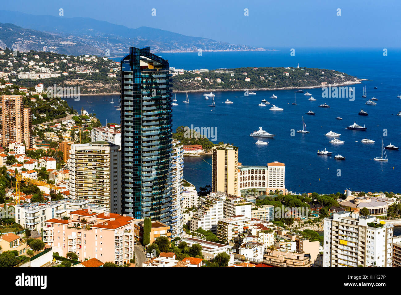 France. Principality of Monaco (98). Monte Carlo. The Odeon tower and the Cap Martin in the background Stock Photo