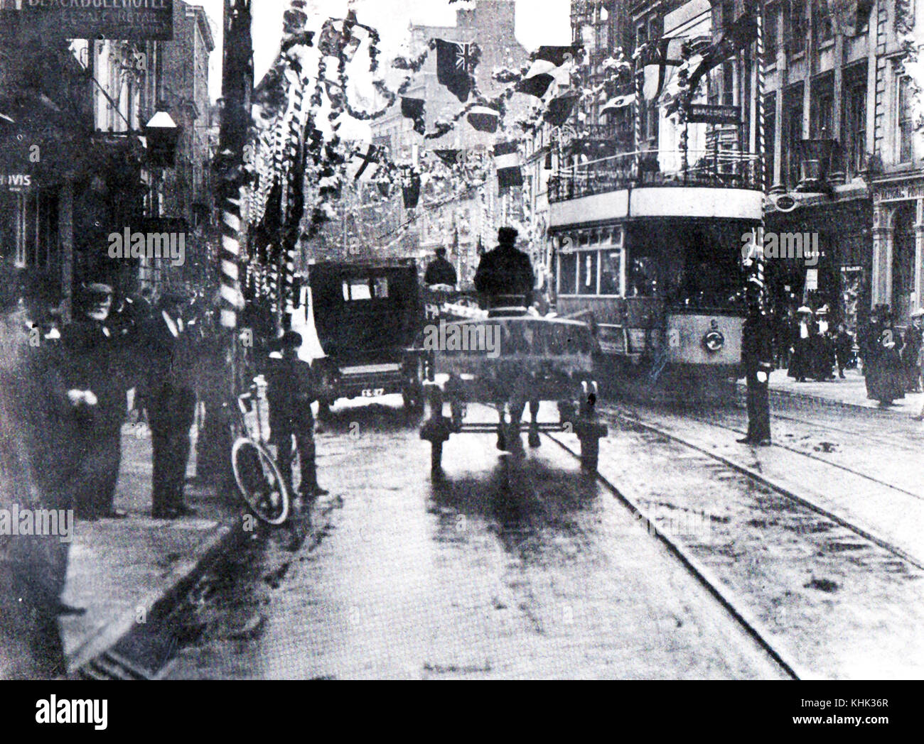 Christmas 1907 - Transport - Trams, motor vehicle and horse drawn cart in Lincoln High Street, England Stock Photo