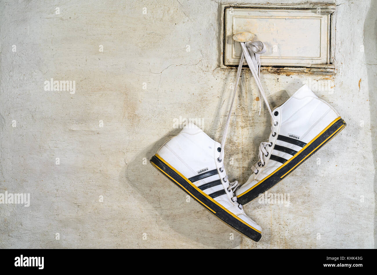 Minsk, Belarus - September 29, 2017: White Adidas Sneakers Hang on Laces  and Dry on a Russian Stove, Close-up Stock Photo - Alamy