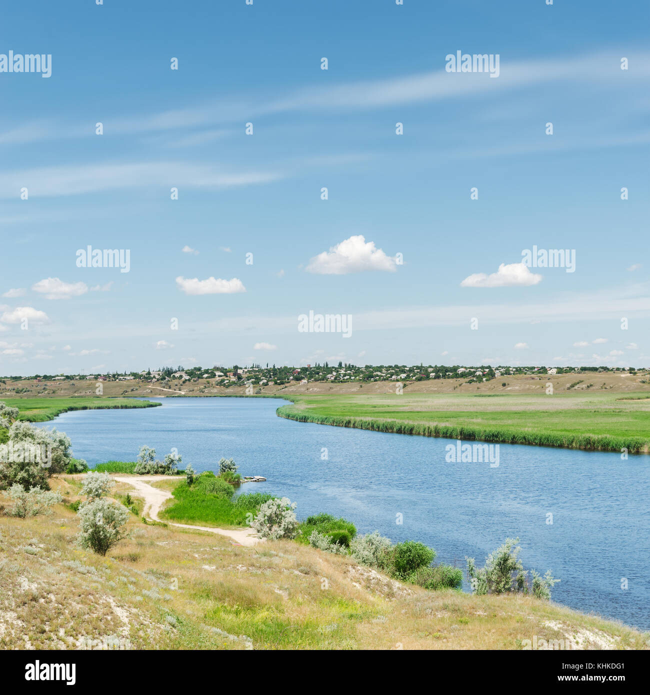 river under blue sky with clouds Stock Photo - Alamy