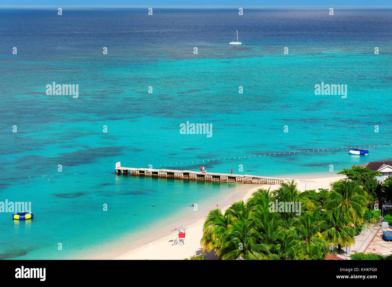 Caribbean beach and pier in Montego Bay, Jamaica island Stock Photo
