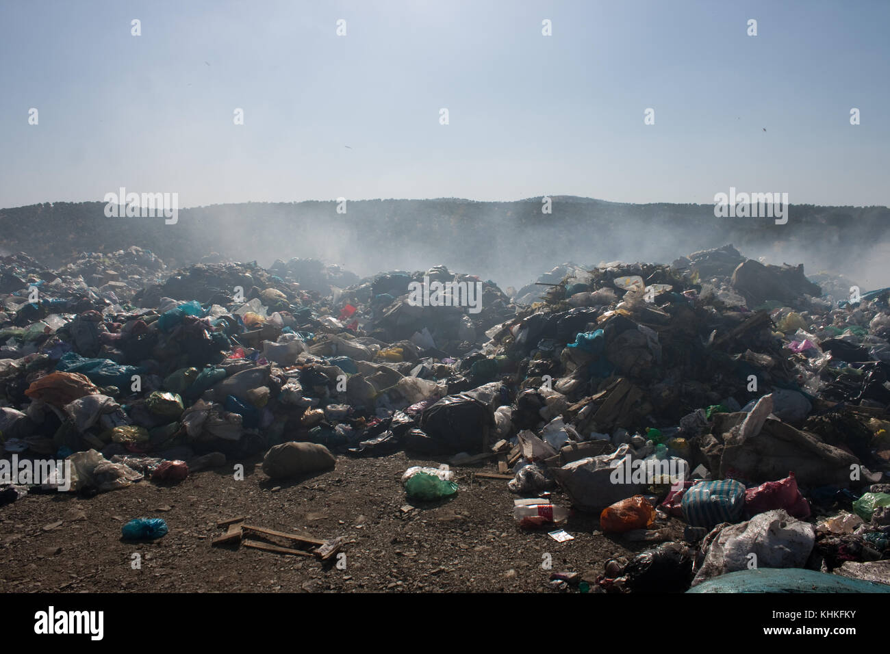 Burning rubbish in nature cause lots of air pollution and destroy the environment Stock Photo