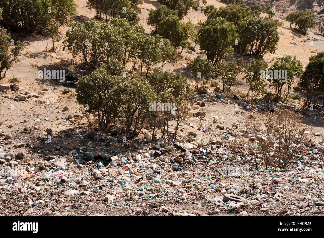 Burning rubbish in nature cause lots of air pollution and destroy the environment Stock Photo