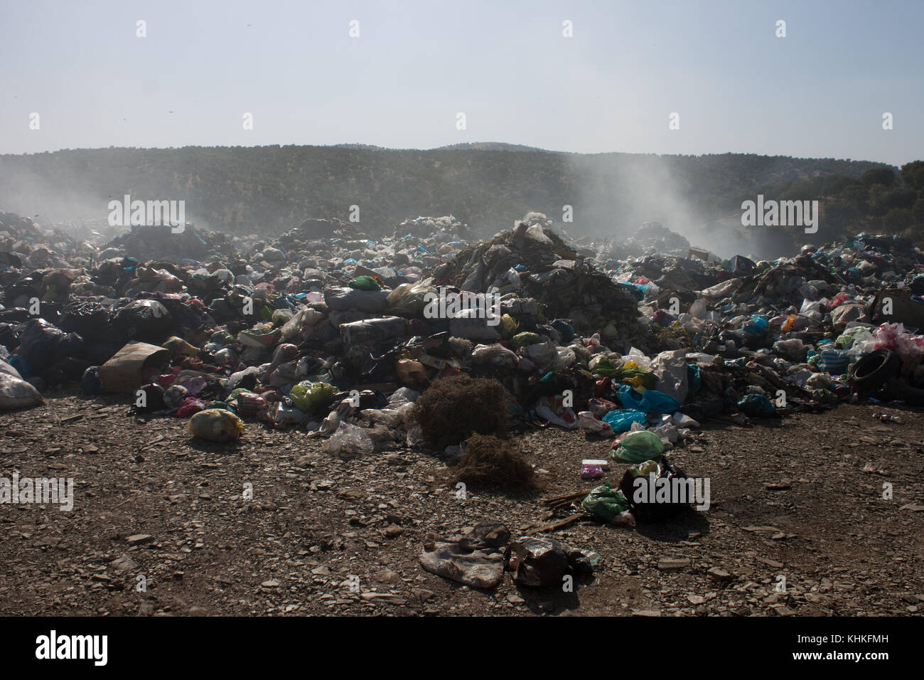 Burning rubbish in nature cause lots of air pollution and destroy the environment Stock Photo