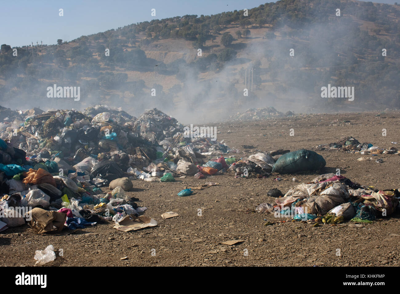 Burning rubbish in nature cause lots of air pollution and destroy the environment Stock Photo
