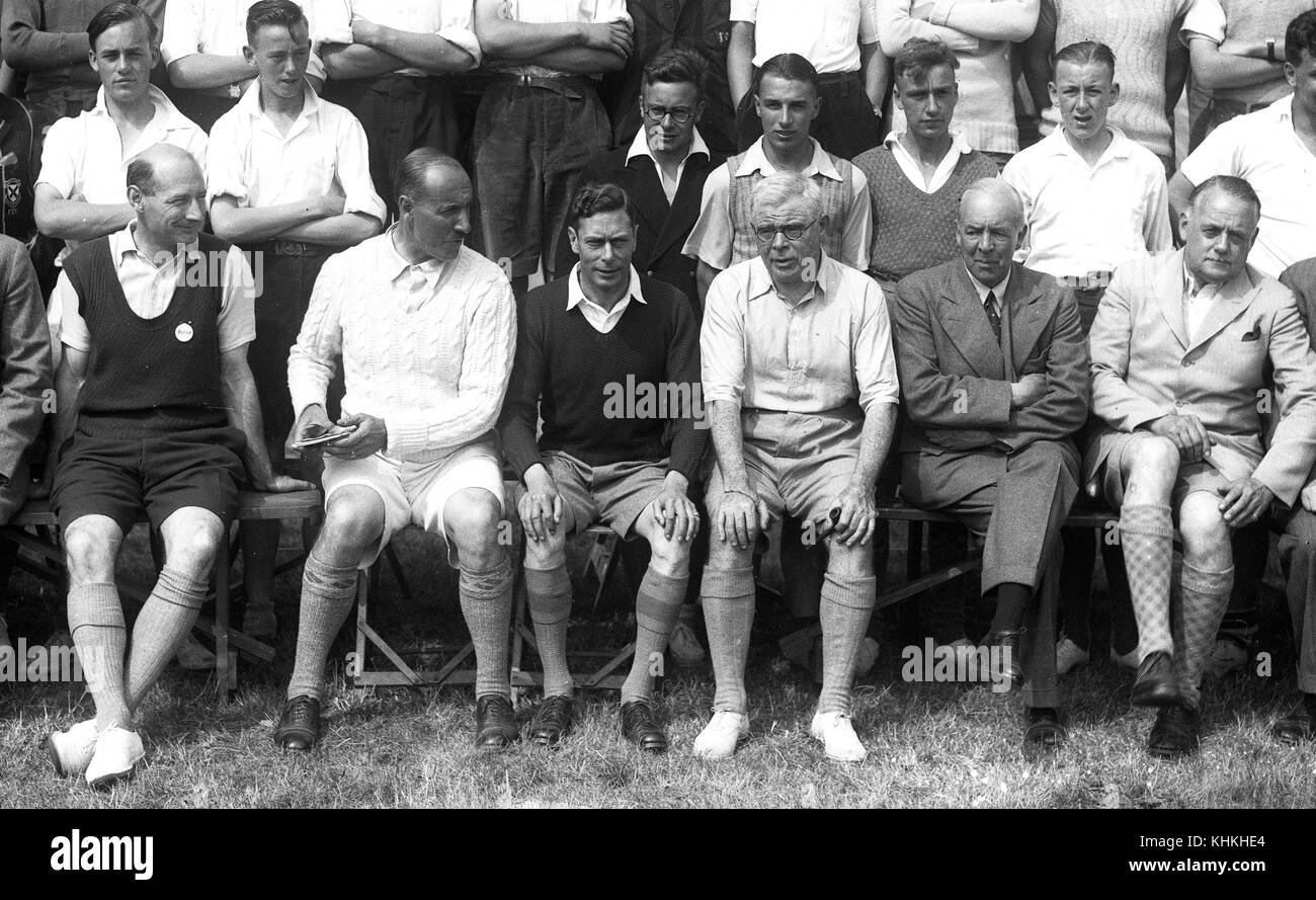 King George VI wearing shorts at Southwold Boys Club summer camp at the Duke of York camp. 03 August 1937 with Captain Patterson on the left of the KIng Stock Photo