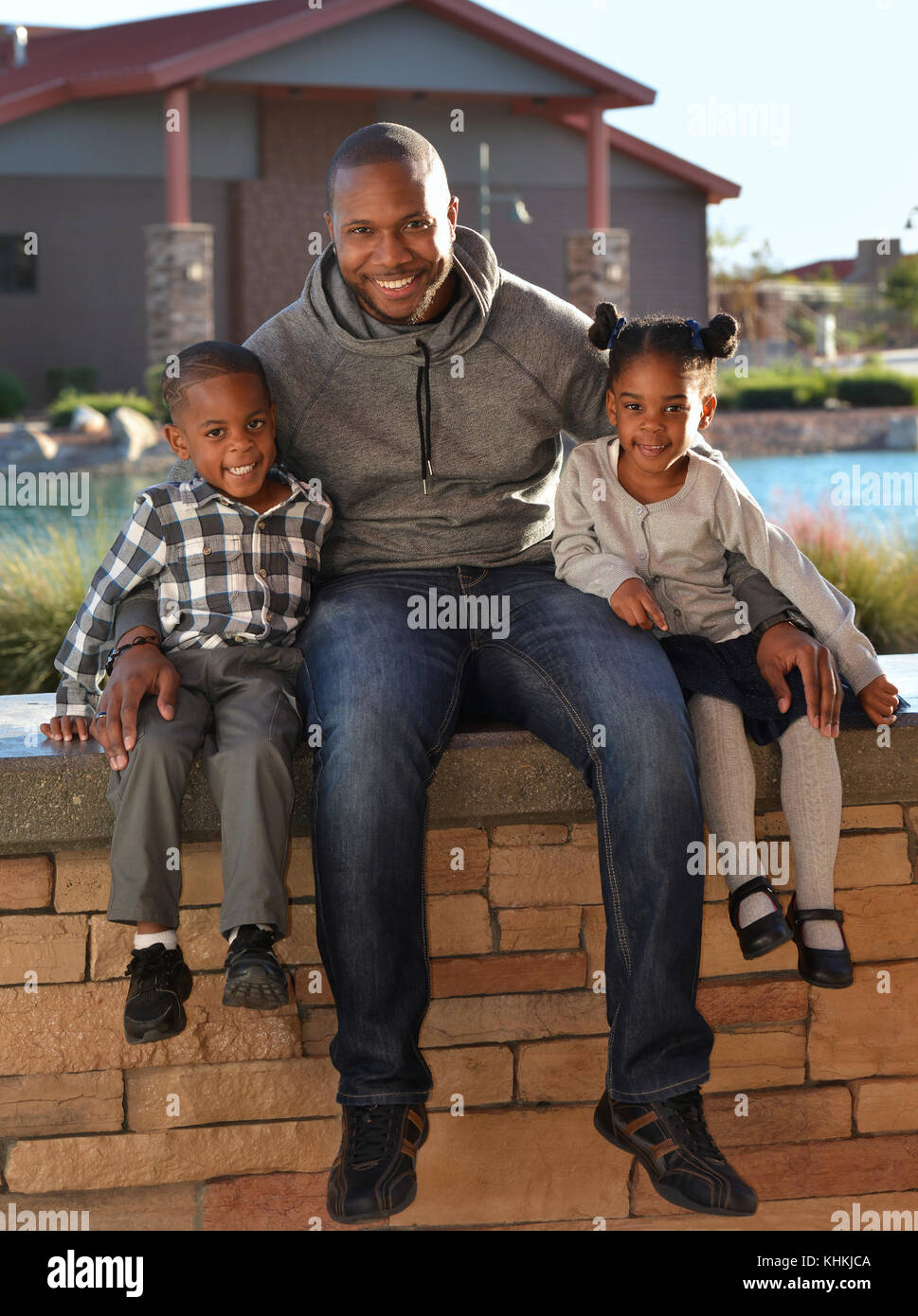 【son and daughter 】ブラック African American Man with son and daughter in a park Stock Photo