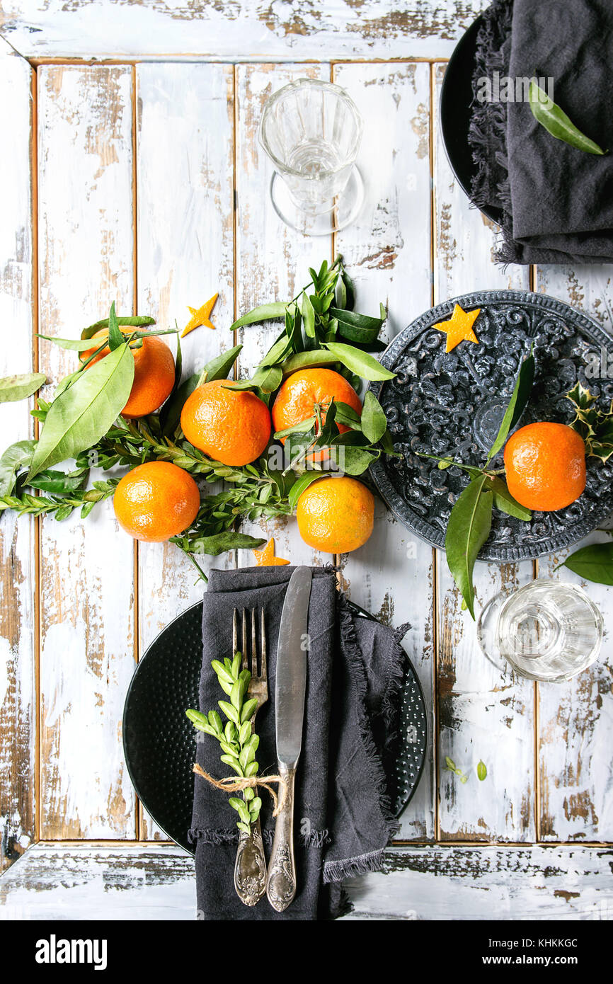 Christmas table decorations with clementines Stock Photo Alamy