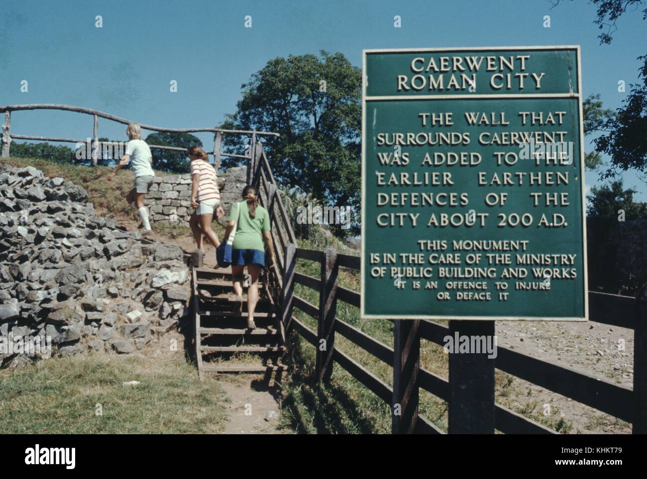 Caerwent Roman City, with sign reading 'The wall that surrounds Caerwent was added to the earlier earthen defence of the city about 200 ad, this monument is in the care of the ministry of public building and works, it an offence to injure or deface it', United Kingdom, 1965. Stock Photo