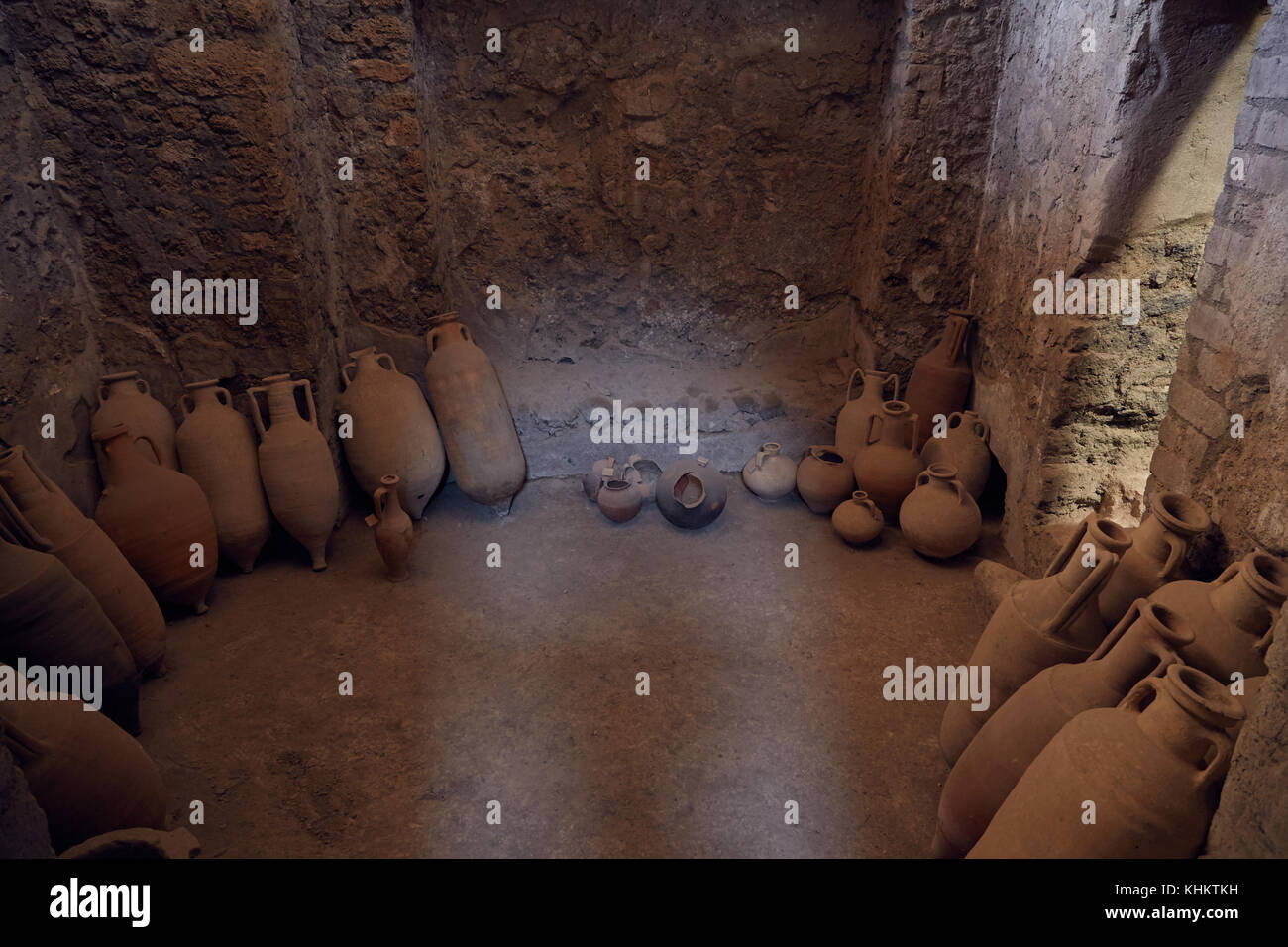 Old ceramic jugs preserved in Pompeii, Italy Stock Photo