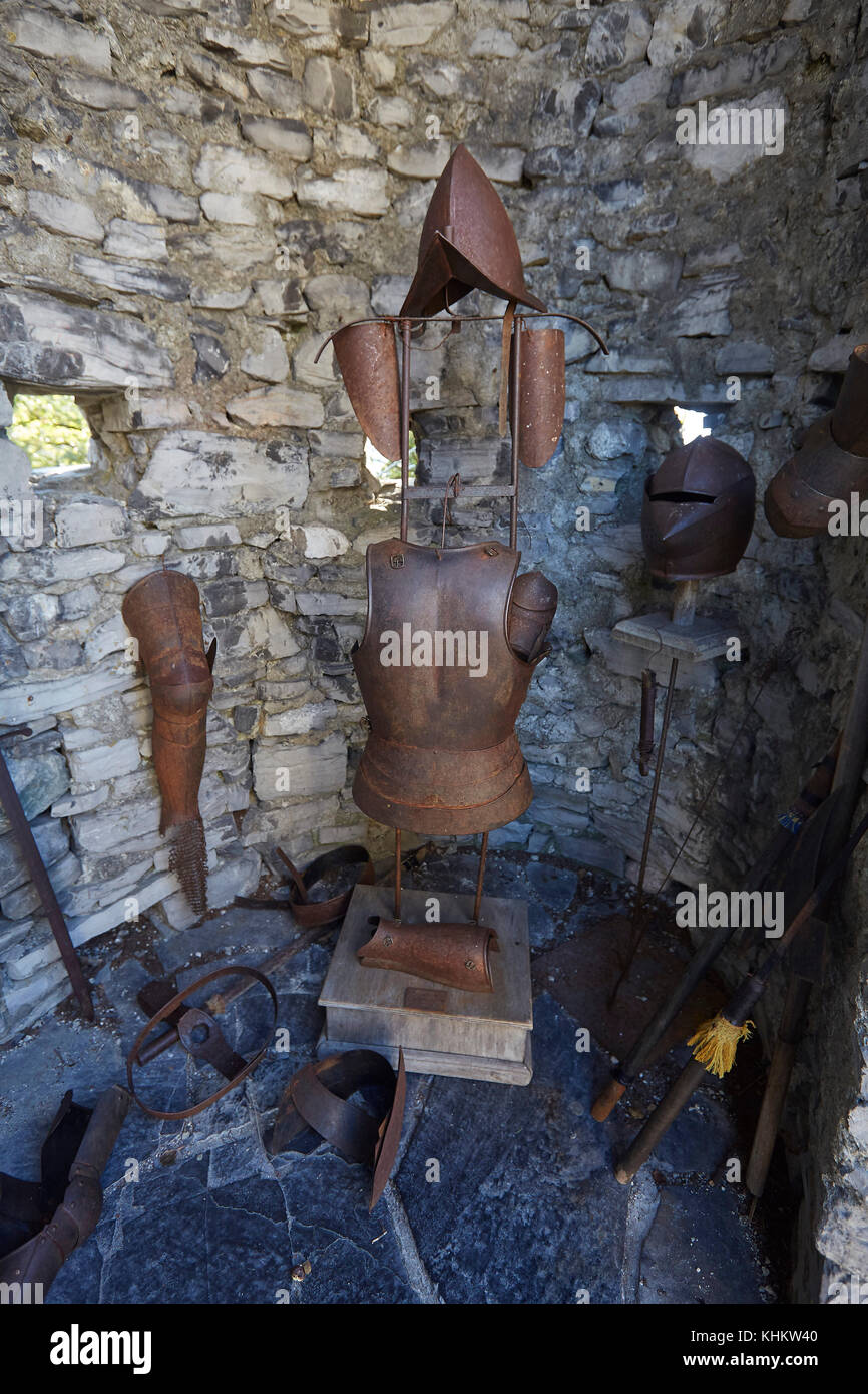 Suite of armour on display in Castello di Vezio watchtower, Varenna, Lecco Lombardy, Italy. Stock Photo