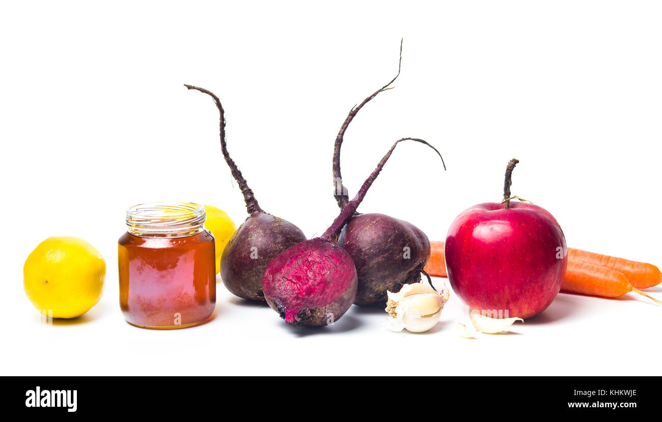 Raw beet with healthy fruits and vegetables isolated on white Stock