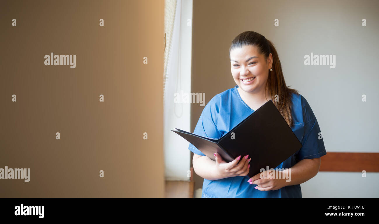 Hispanic nurse assistant hi-res stock photography and images - Alamy
