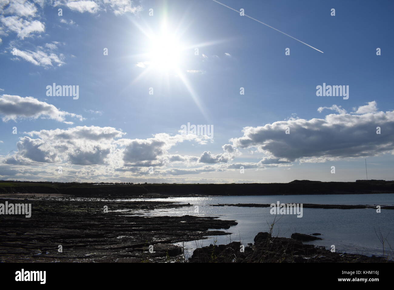 aeroplane over the sun Stock Photo