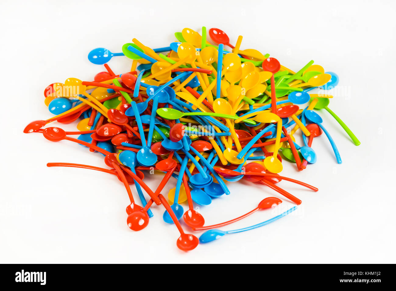 Background of many new colored plastic spoons Stock Photo - Alamy