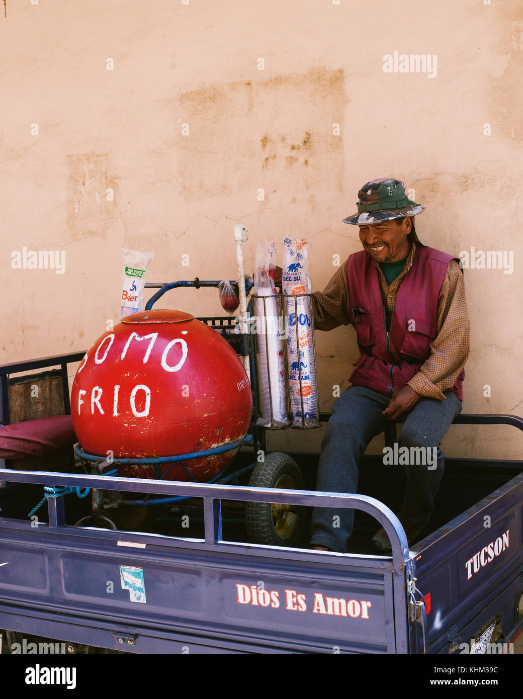 TARATA, COCHABAMBA, BOLIVIA S.A. - OCTOBER 2017: A street vendor sells Somo Frio, a popular Bolivian drink, in colonial Tarata, Bolivia. Stock Photo