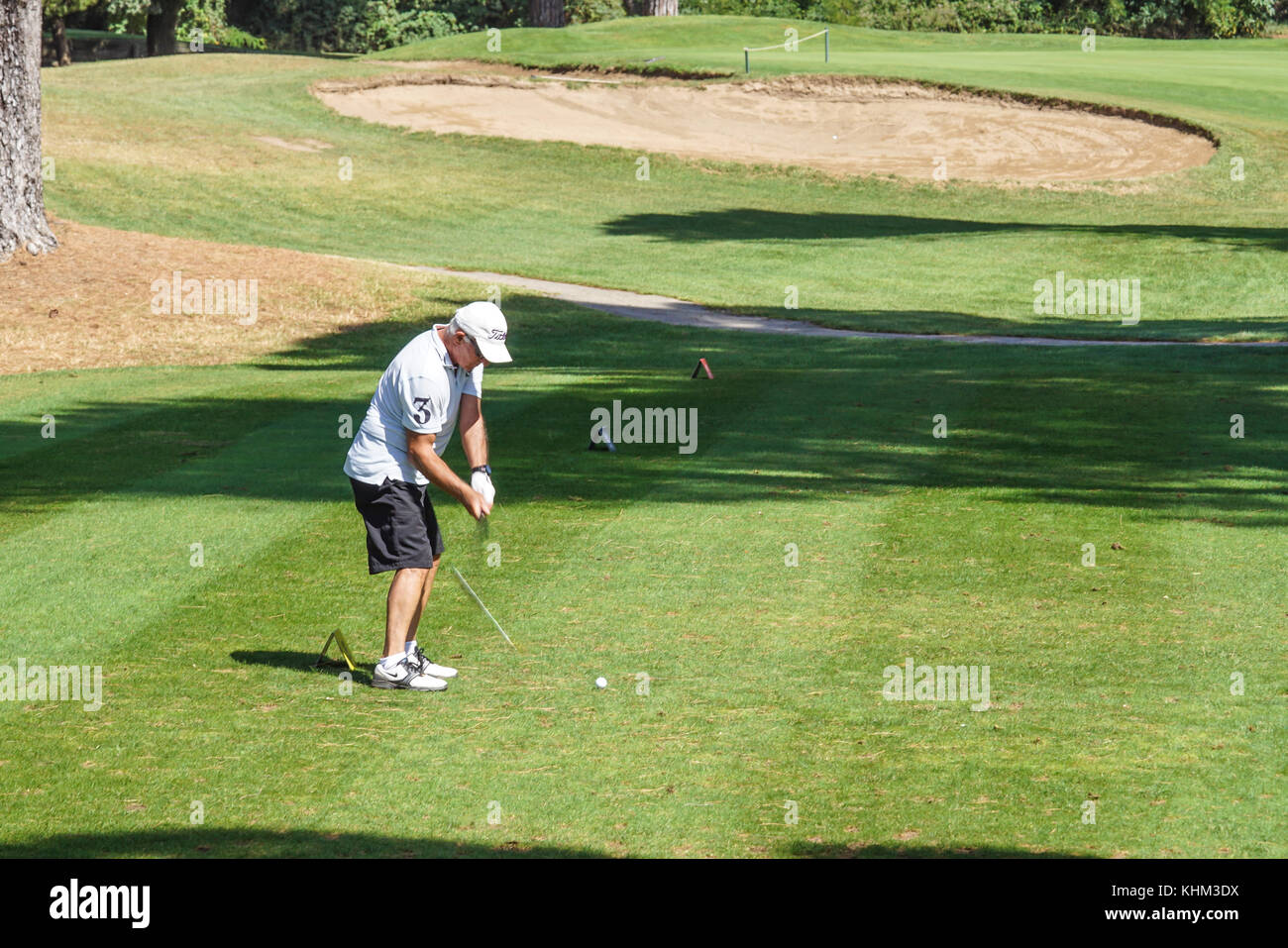 CANNES- GOLF COURSE, FRANCE - AUGUST 15 2017 : an unidentified man plays golf at Cannes-Mougins golf club, France Stock Photo