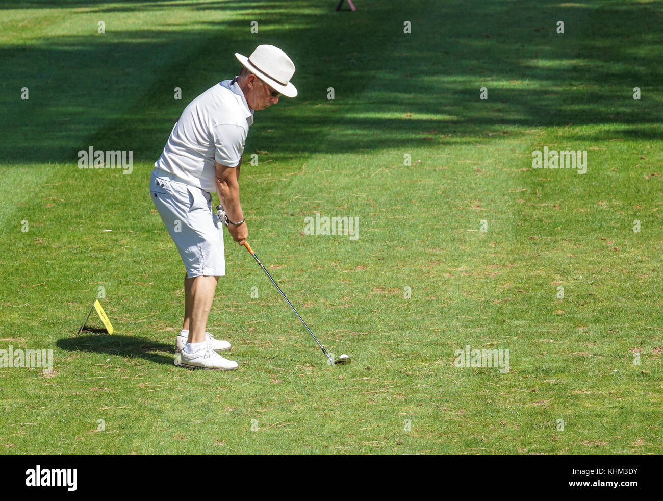 CANNES- GOLF COURSE, FRANCE - AUGUST 15 2017 : an unidentified man plays golf at Cannes-Mougins golf club, France Stock Photo