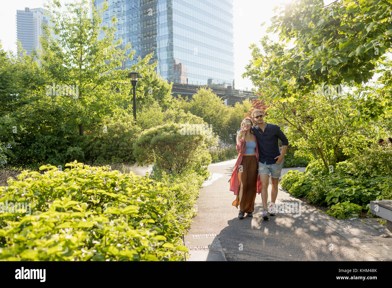 Couple walking together in a park Stock Photo