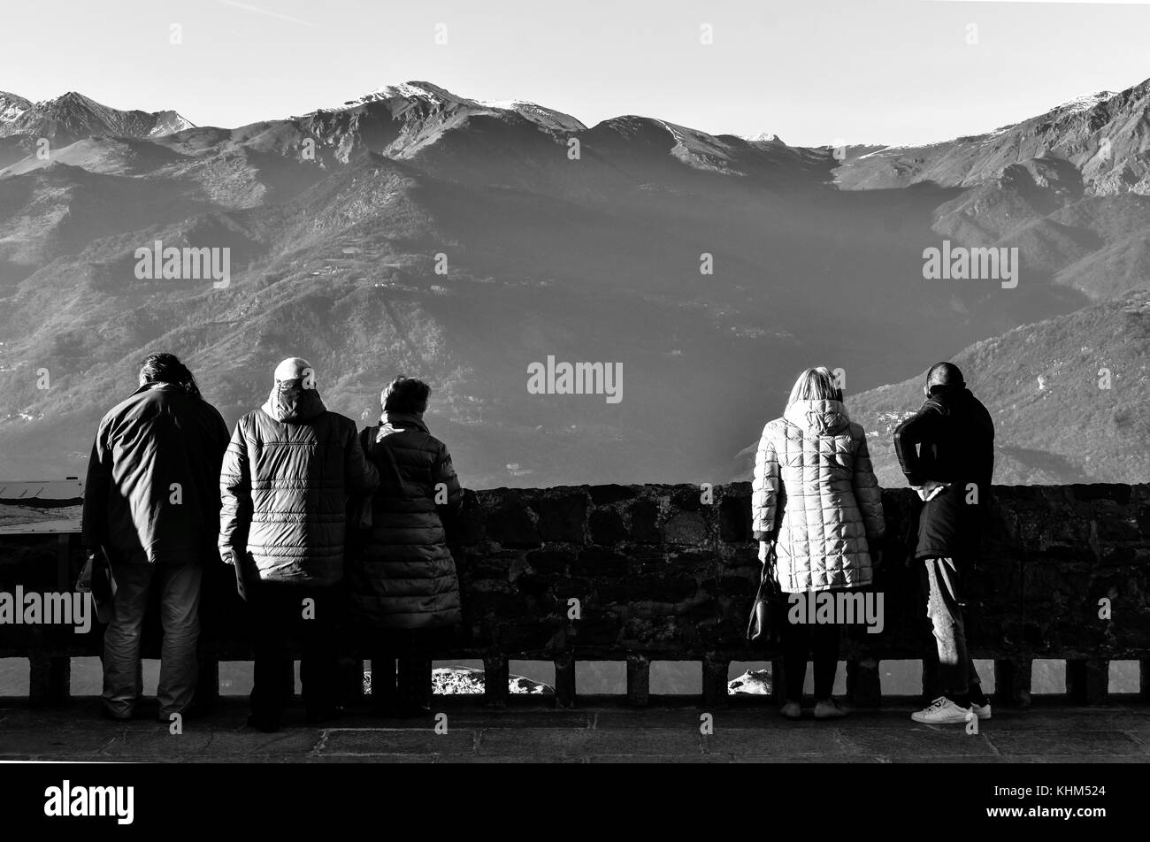 People admiring the view of the Alps in Val di Susa, Piedmont, Italy Stock Photo
