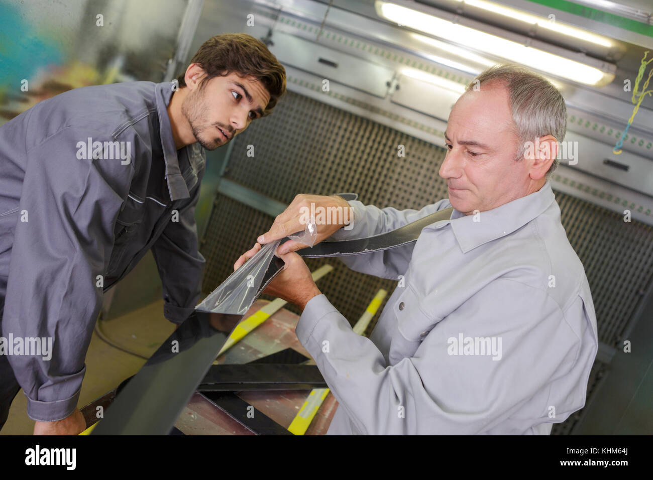 Two mechanics fixing broken hi-res stock photography and images - Alamy