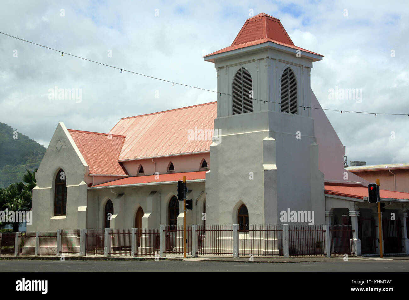 White church and red street light in Apia, Samoa Stock Photo