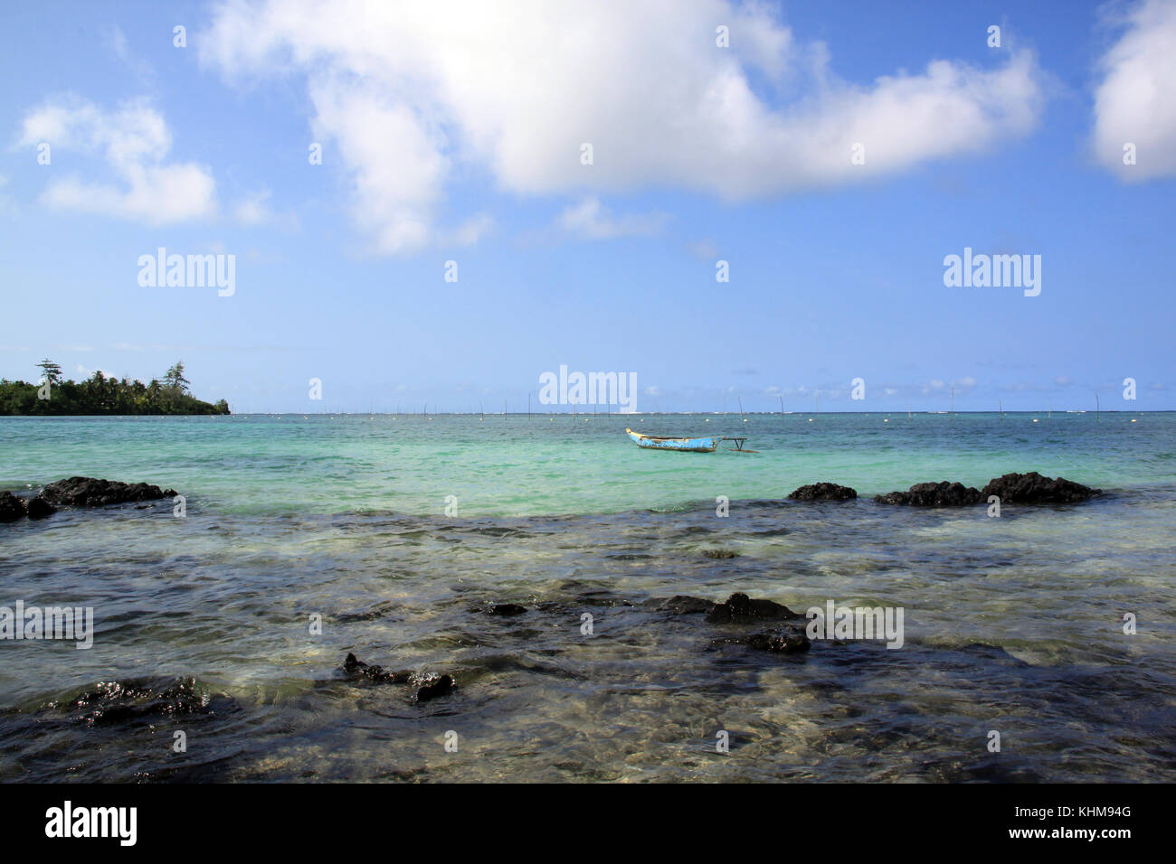 Coast of Upolu island and boat, Samoa Stock Photo - Alamy