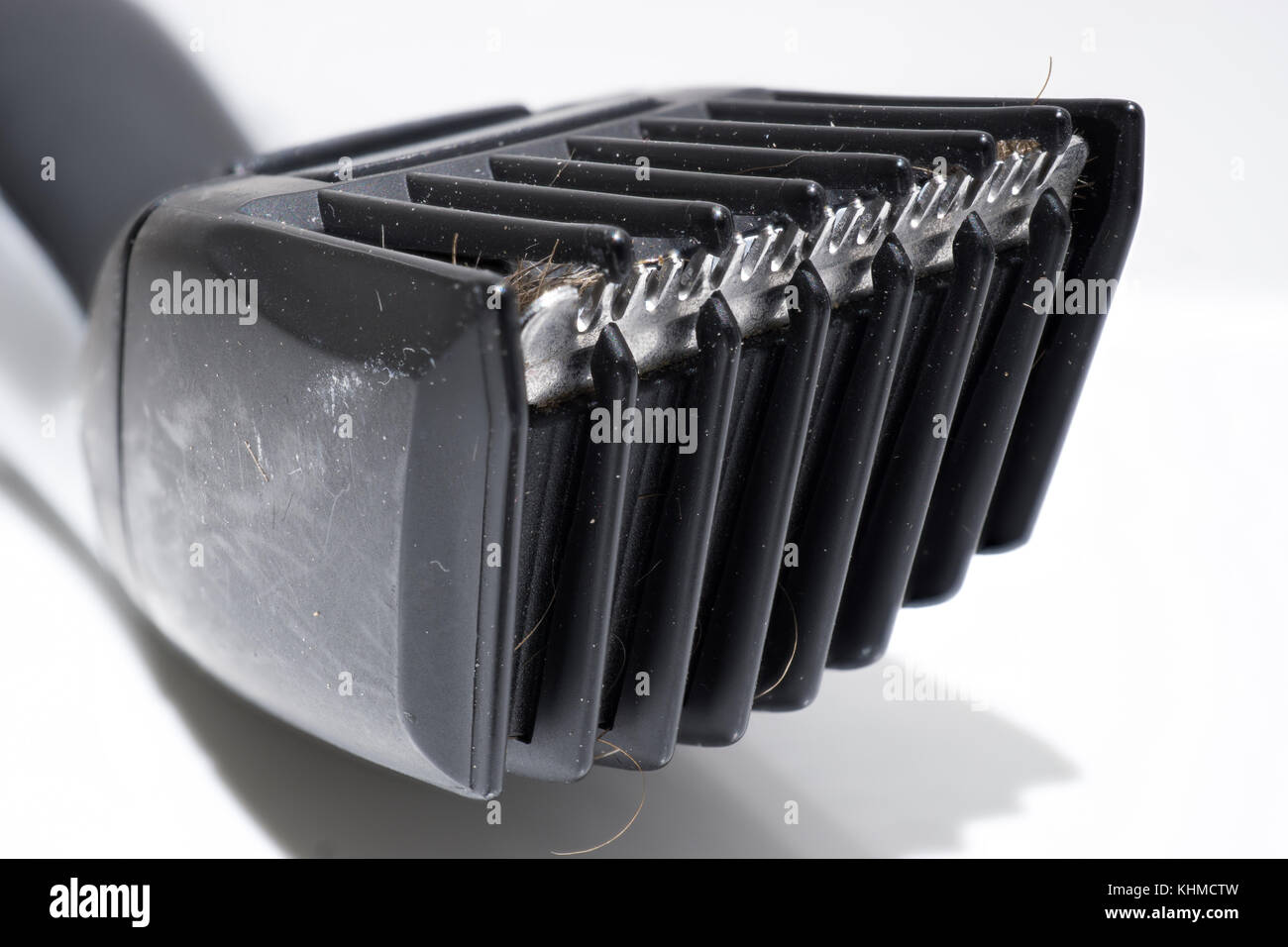 Dirty electric shaver or trimmer in the bath Stock Photo - Alamy