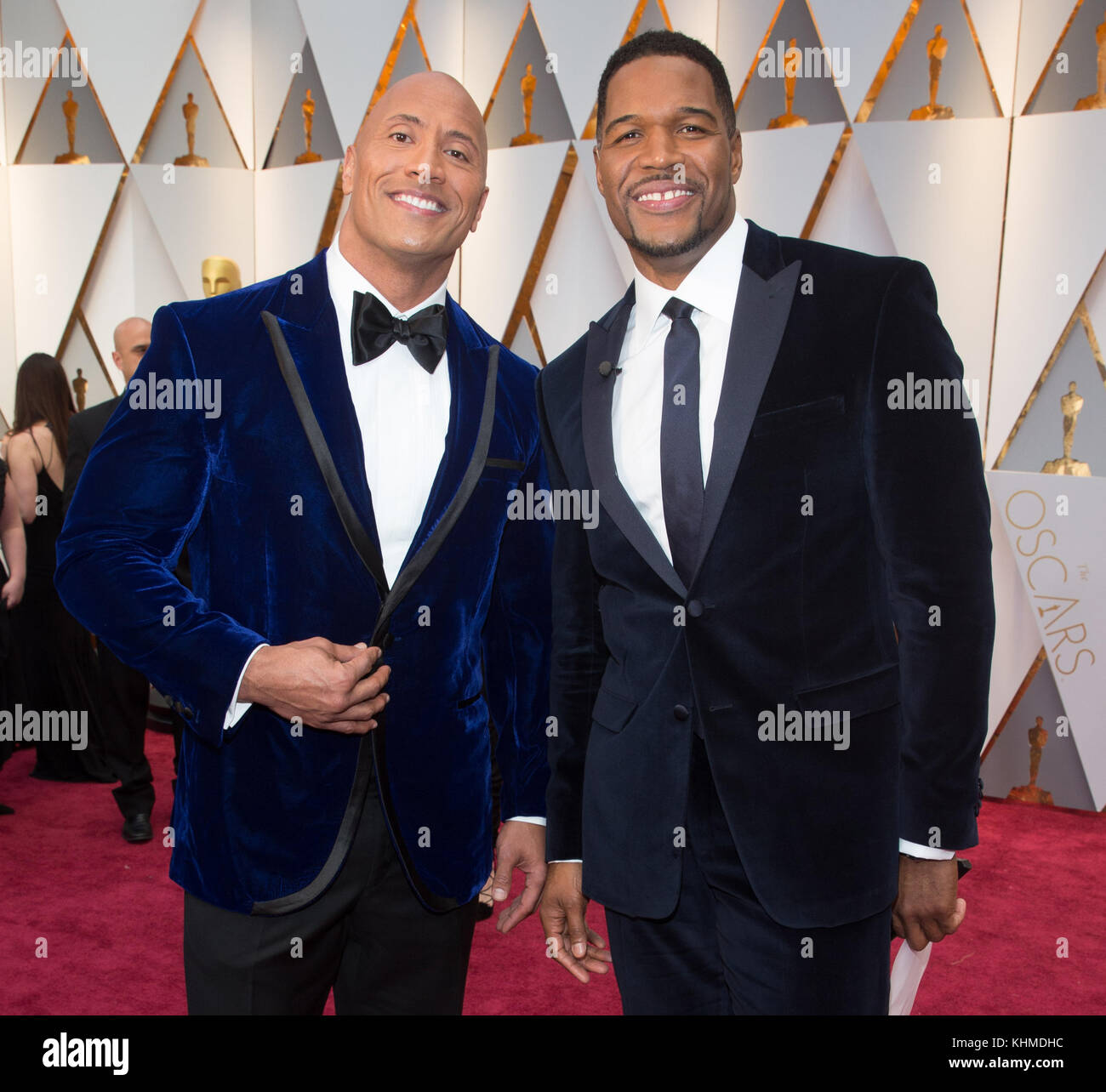 HOLLYWOOD, CA - FEBRUARY 26: Dwayne Johnson and Michael Strahan attends the 89th Annual Academy Awards at Hollywood & Highland Center on February 26, 2017 in Hollywood, California  People:  Dwayne Johnson and Michael Strahan  Transmission Ref:  MNC Stock Photo