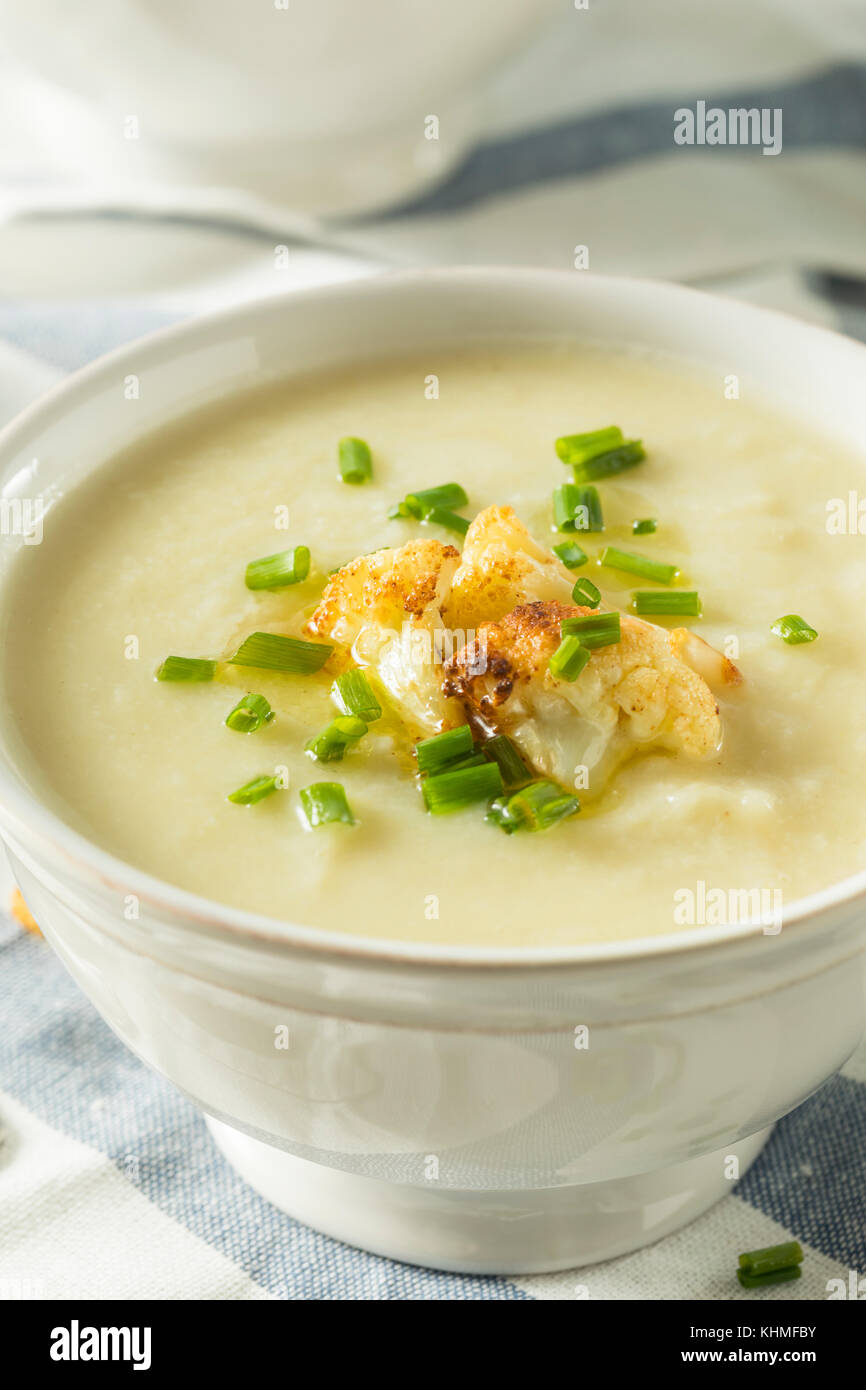 Healthy Homemade Cauliflower Soup with Butter and Chives Stock Photo