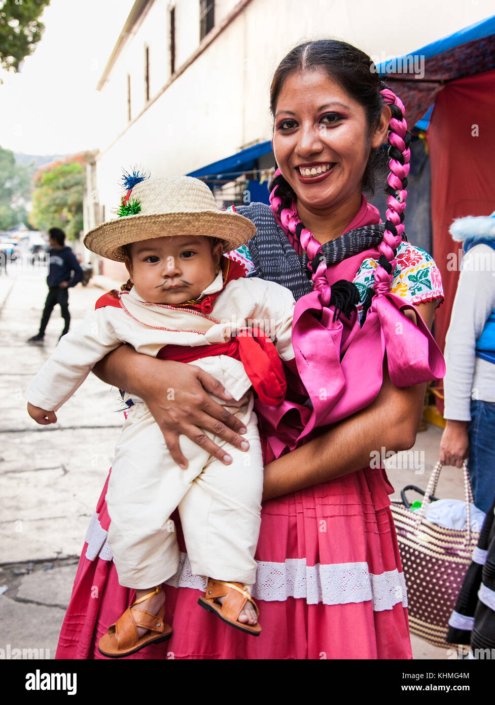 OAXACA, MEXICO-DEC 10, 2015: Beautiful lady and boy celebrating Day of the Virgin of Guadalupe (Dia de la Virgen de Guadalupe) on Dec 10, 2015 . Oaxac Stock Photo