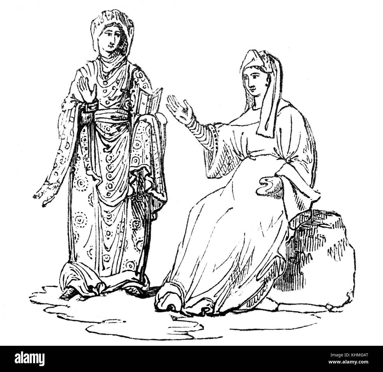 Dressed in the attire of the day, are two  women. The woman standing is Æthelthryth ((636 – 679 AD), an Anglo-Saxon saint known, in a religious context, as Etheldreda or Audrey. She was an East Anglian princess, a Fenland and Northumbrian queen and Abbess of Ely. England. Stock Photo