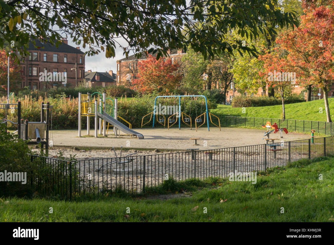 Govanhill park in late autumn sunlight, Glasgow, Scotland, UK Stock Photo