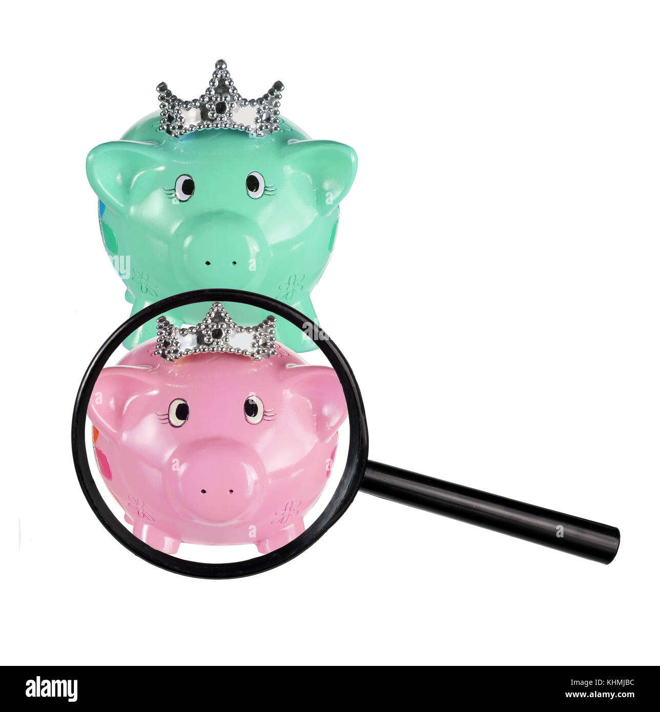 Piggy Banks and Magnifying Glass on White Background Stock Photo Alamy